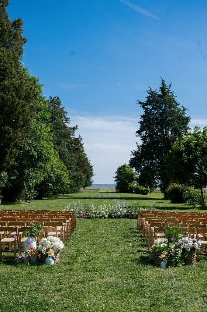floral ground arch for an Annapolis waterfront wedding ceremony at Whitehall